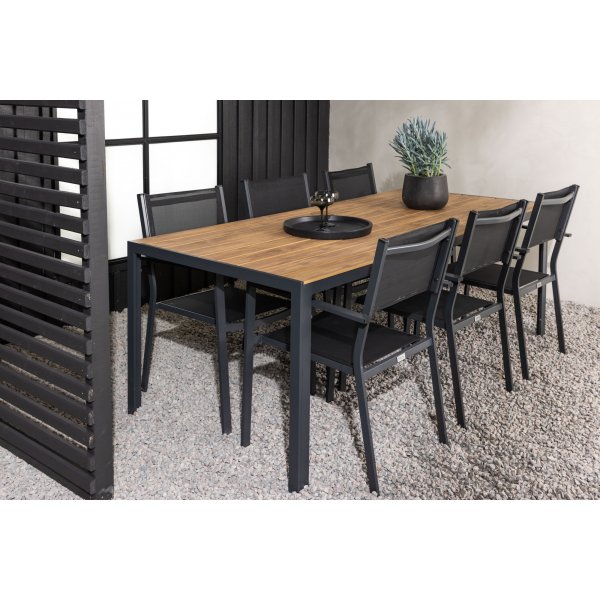 Matvaregruppen i Chania; 6 Copacabana-stoler med spisebord 205 x 90 cm - Svart/natur + Tekstilimpregnering for utembler